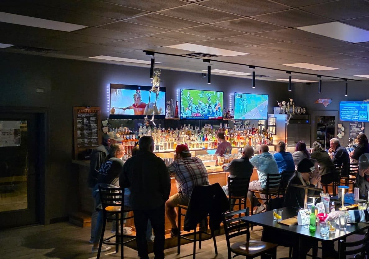 The match up on the screens at Beaufort Bar, the room watching from the bar